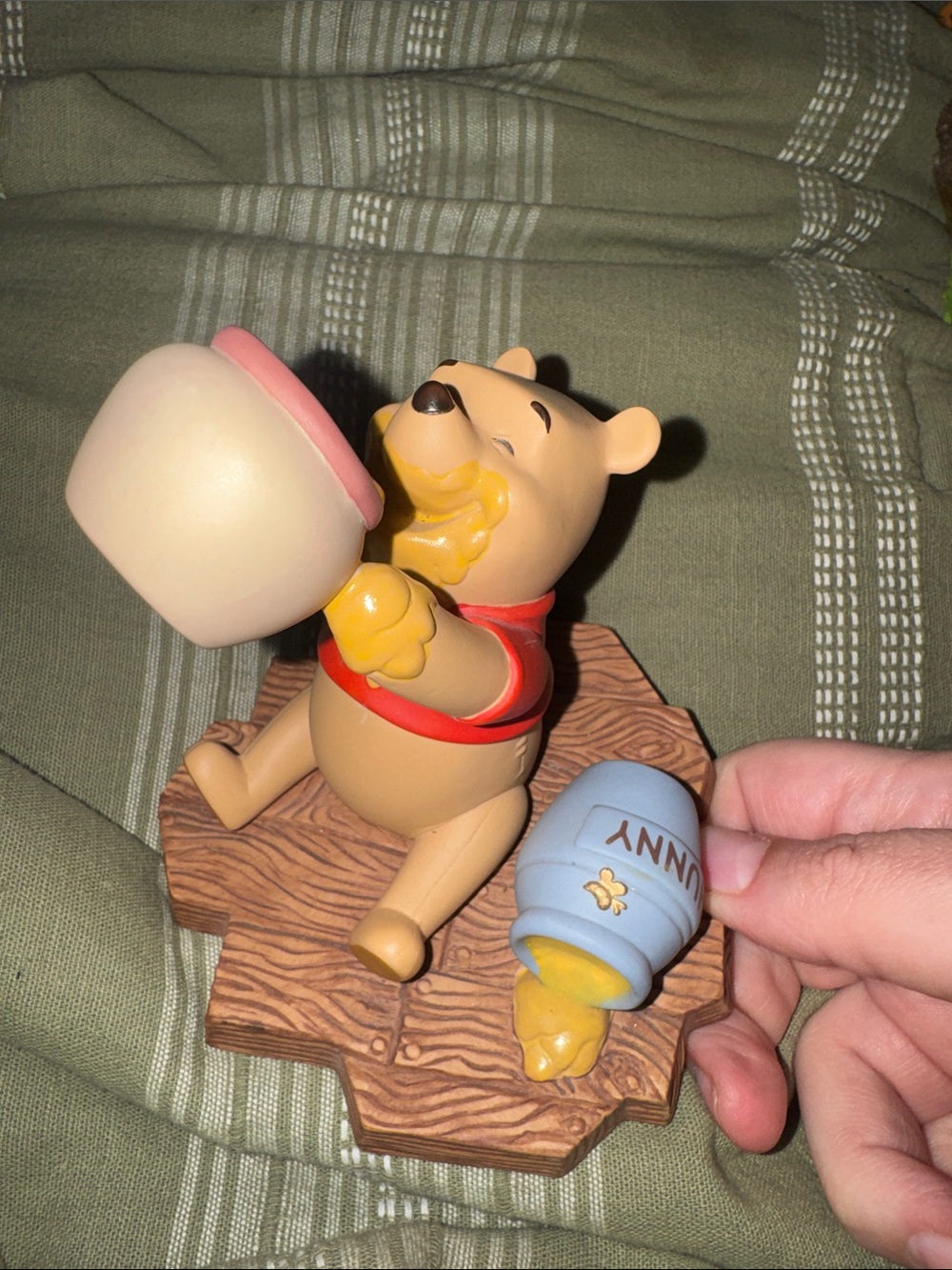 Disney Winnie the Pooh Figurine in Yellow with Red and Blue Accents